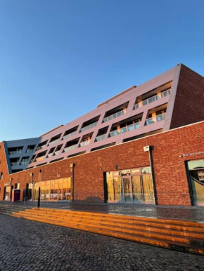 Dock 07 - modernes 4 Sterne-Ferienapartment direkt am Hafen Wismar
